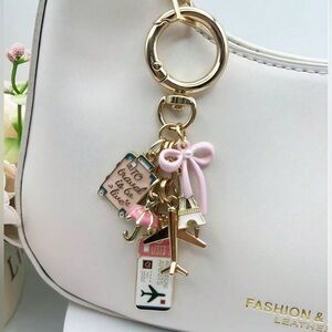 Multi Paris themed bag charm in pink, white and gold
